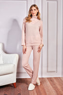 Completo in maglia con collo alto